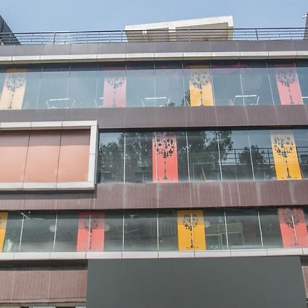 Oyo 7669 The Trinitywood Hotel بنغالور المظهر الخارجي الصورة