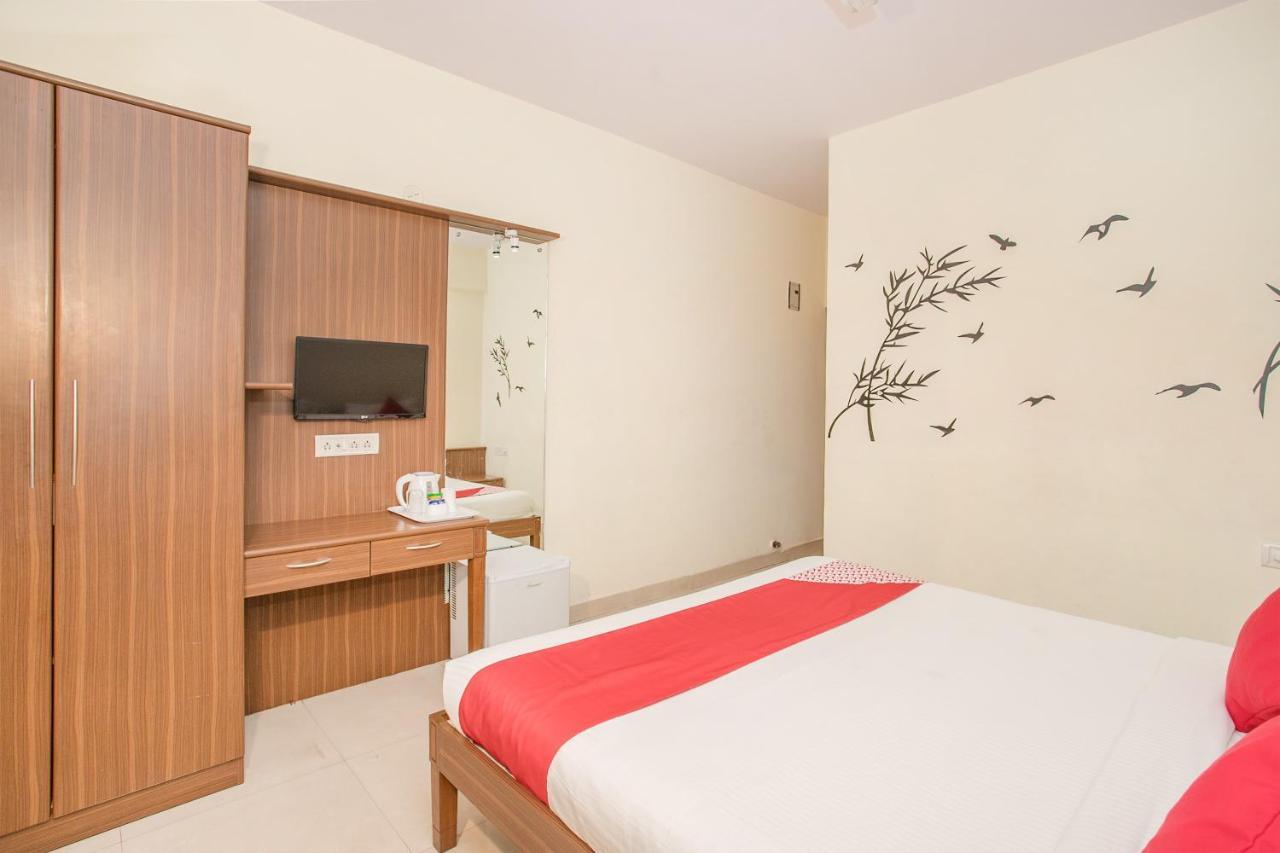 Oyo 7669 The Trinitywood Hotel بنغالور المظهر الخارجي الصورة