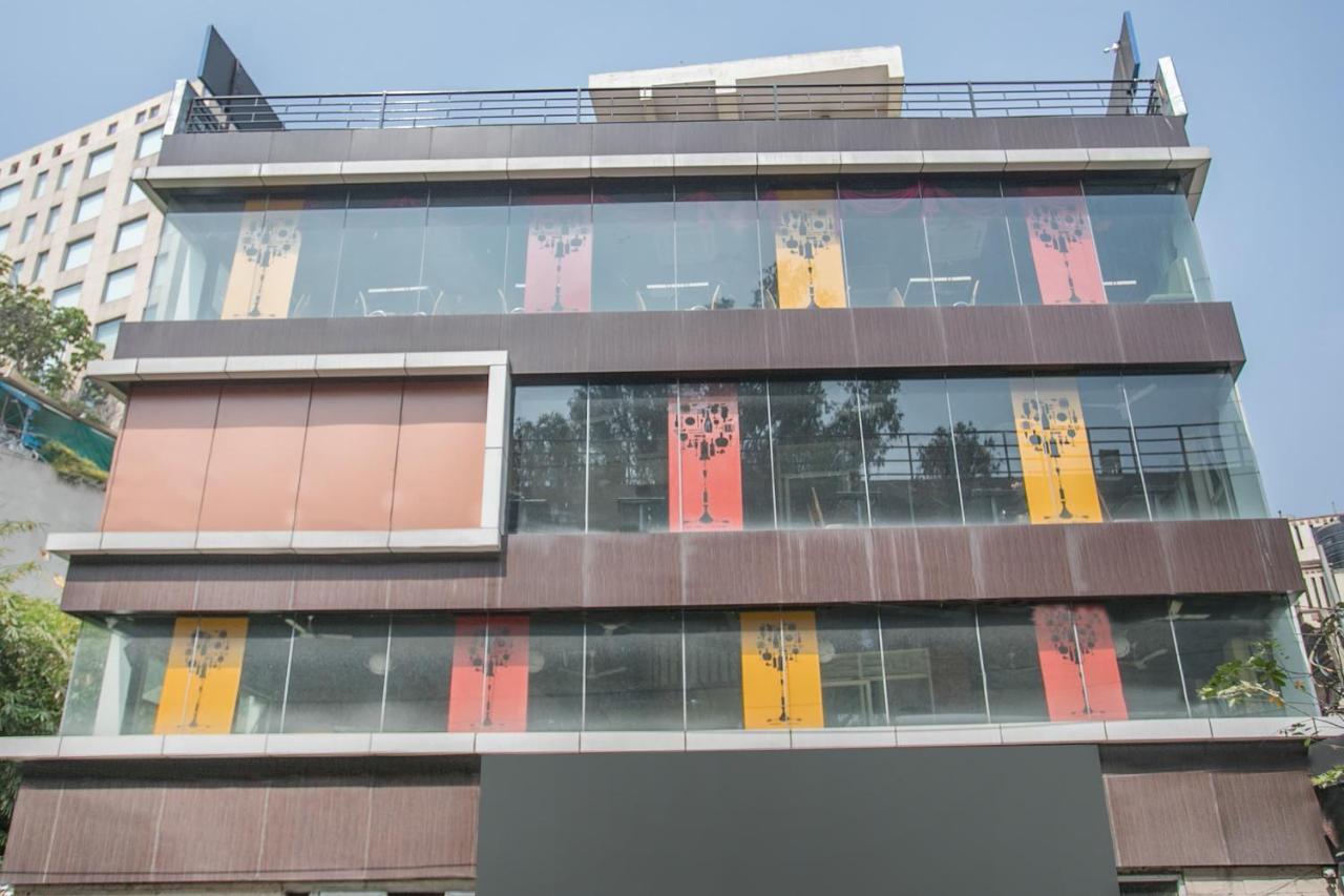 Oyo 7669 The Trinitywood Hotel بنغالور المظهر الخارجي الصورة