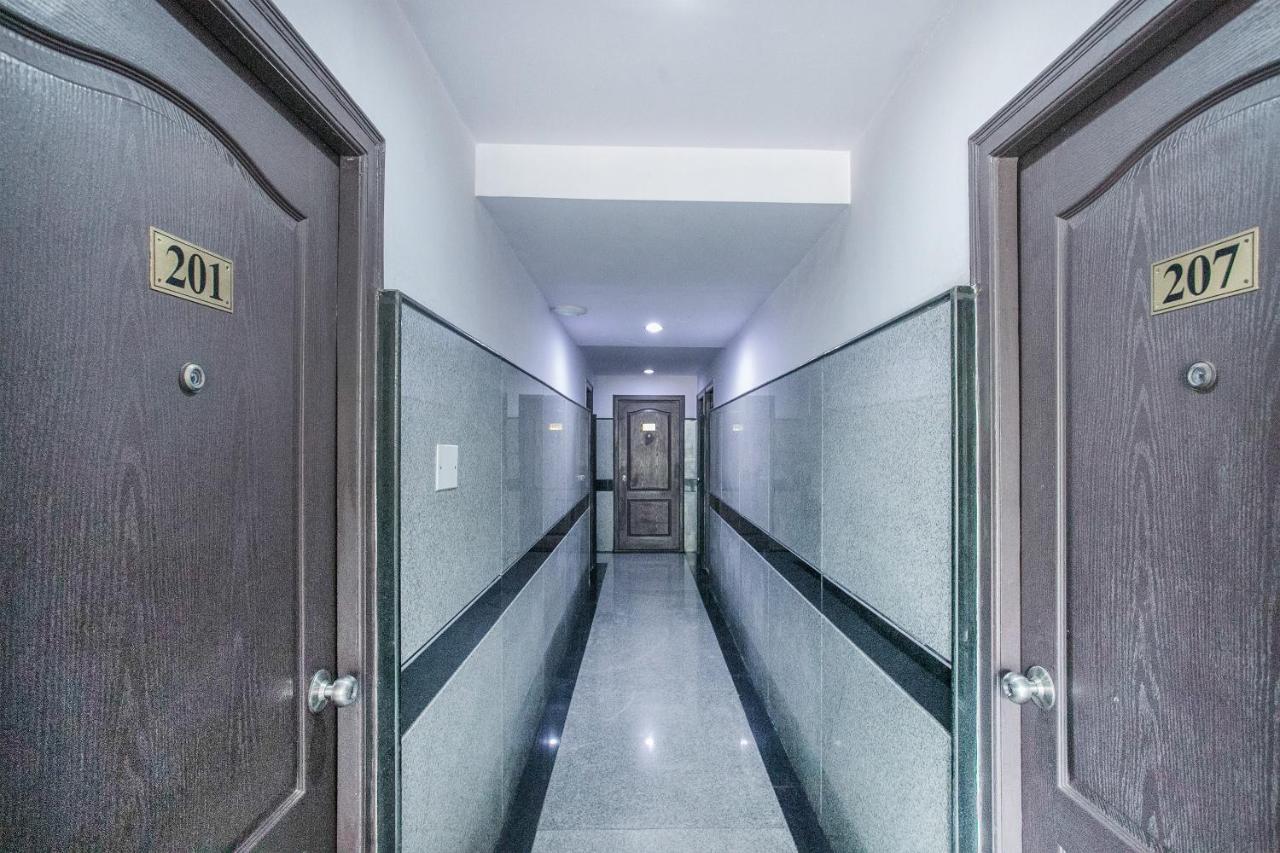 Oyo 7669 The Trinitywood Hotel بنغالور المظهر الخارجي الصورة