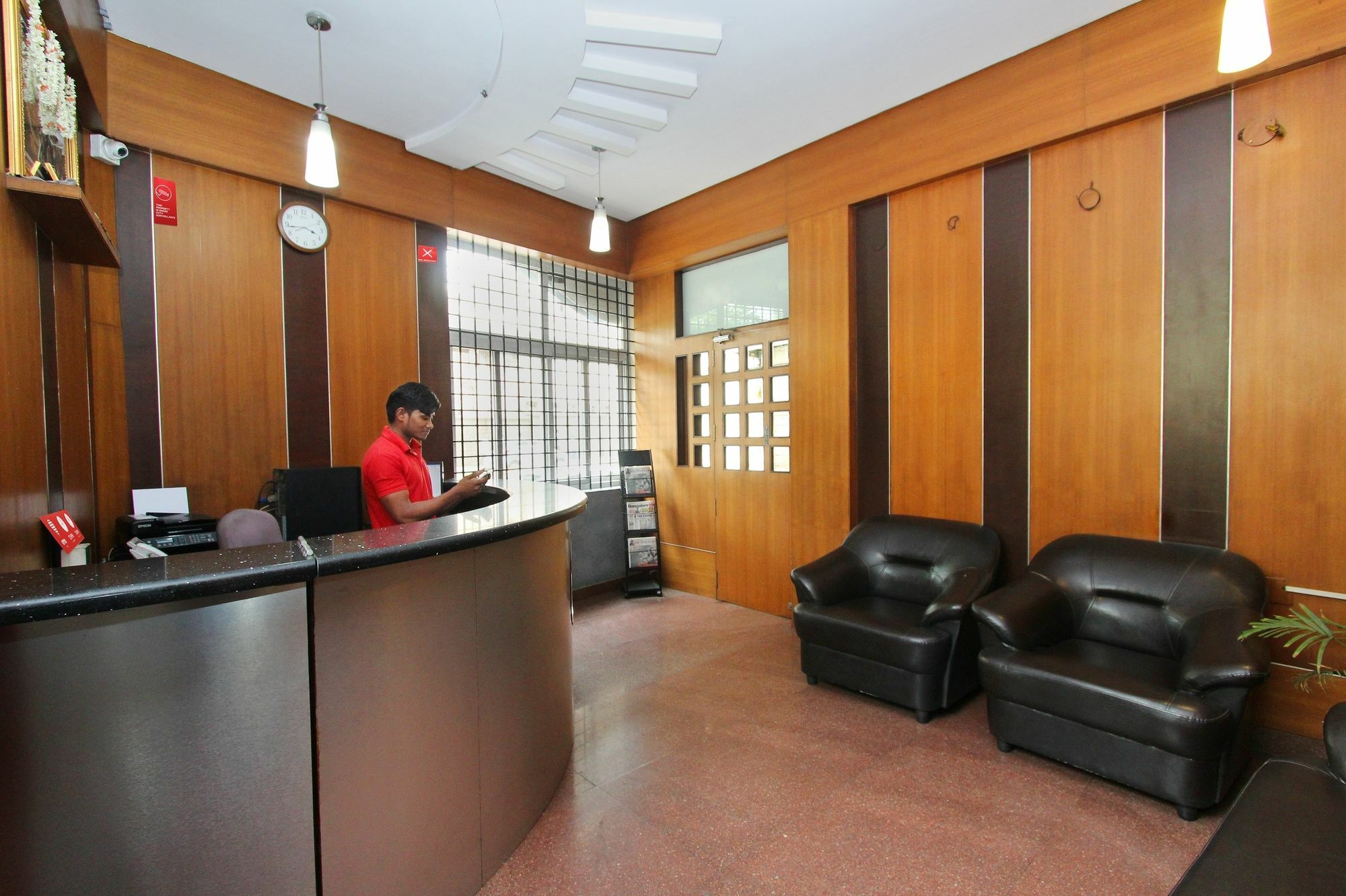 Oyo 7669 The Trinitywood Hotel بنغالور المظهر الخارجي الصورة